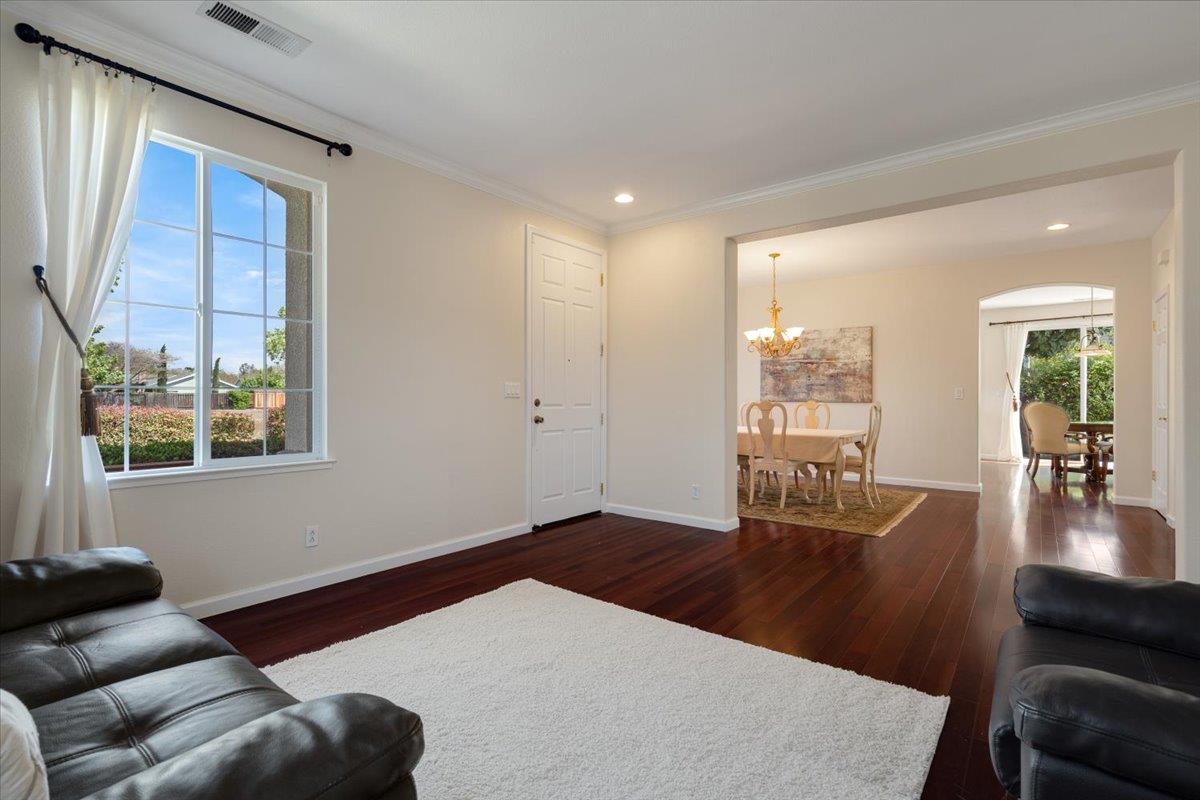 9145 Desiderio Way Gilroy, CA 95020 - Photo 7 of 33 a living room with furniture and a large window