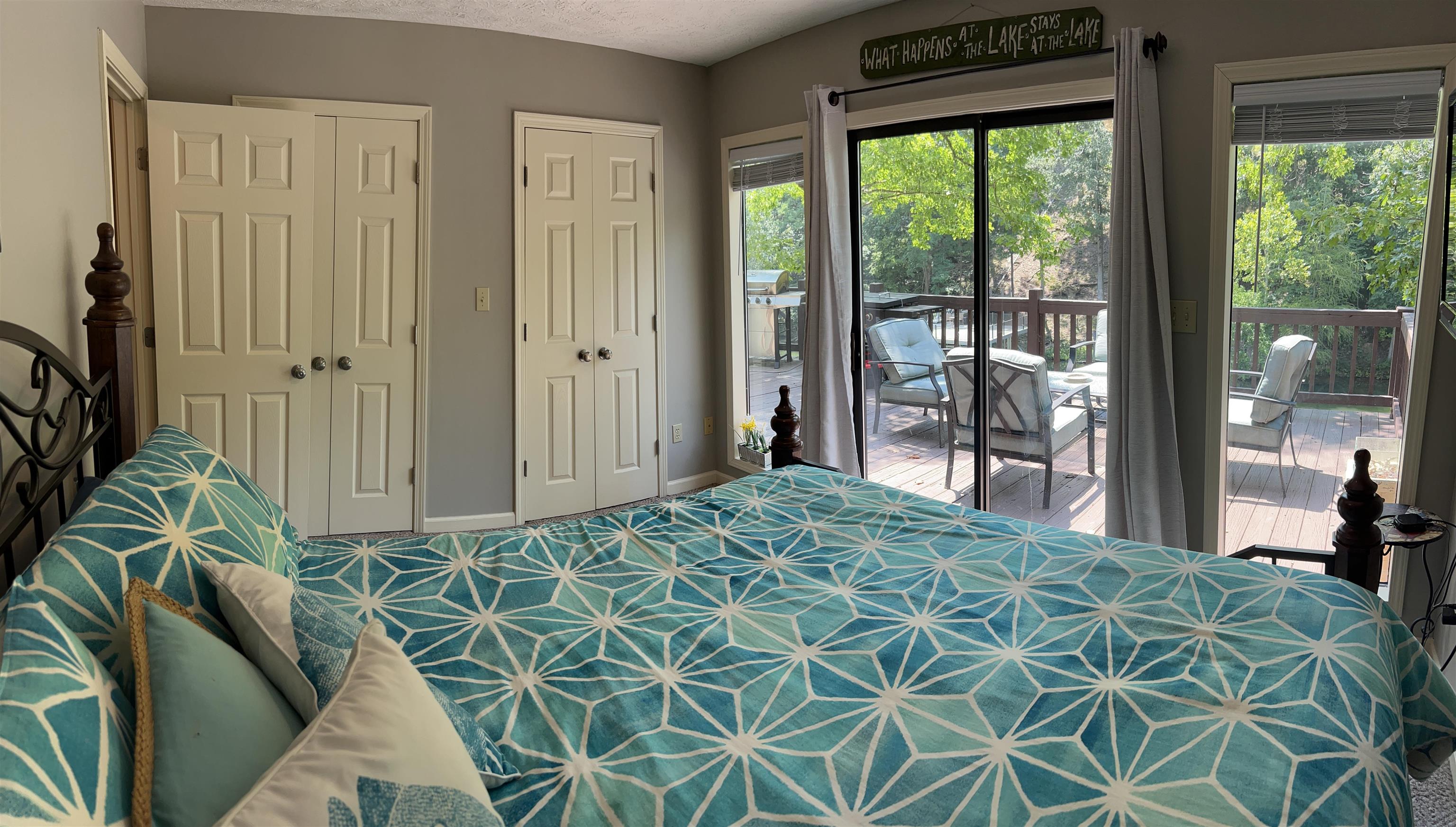 60 Point Grand Bluff Savannah, TN 38372 - Photo 17 of 34 a bed sitting in a bedroom next to a window