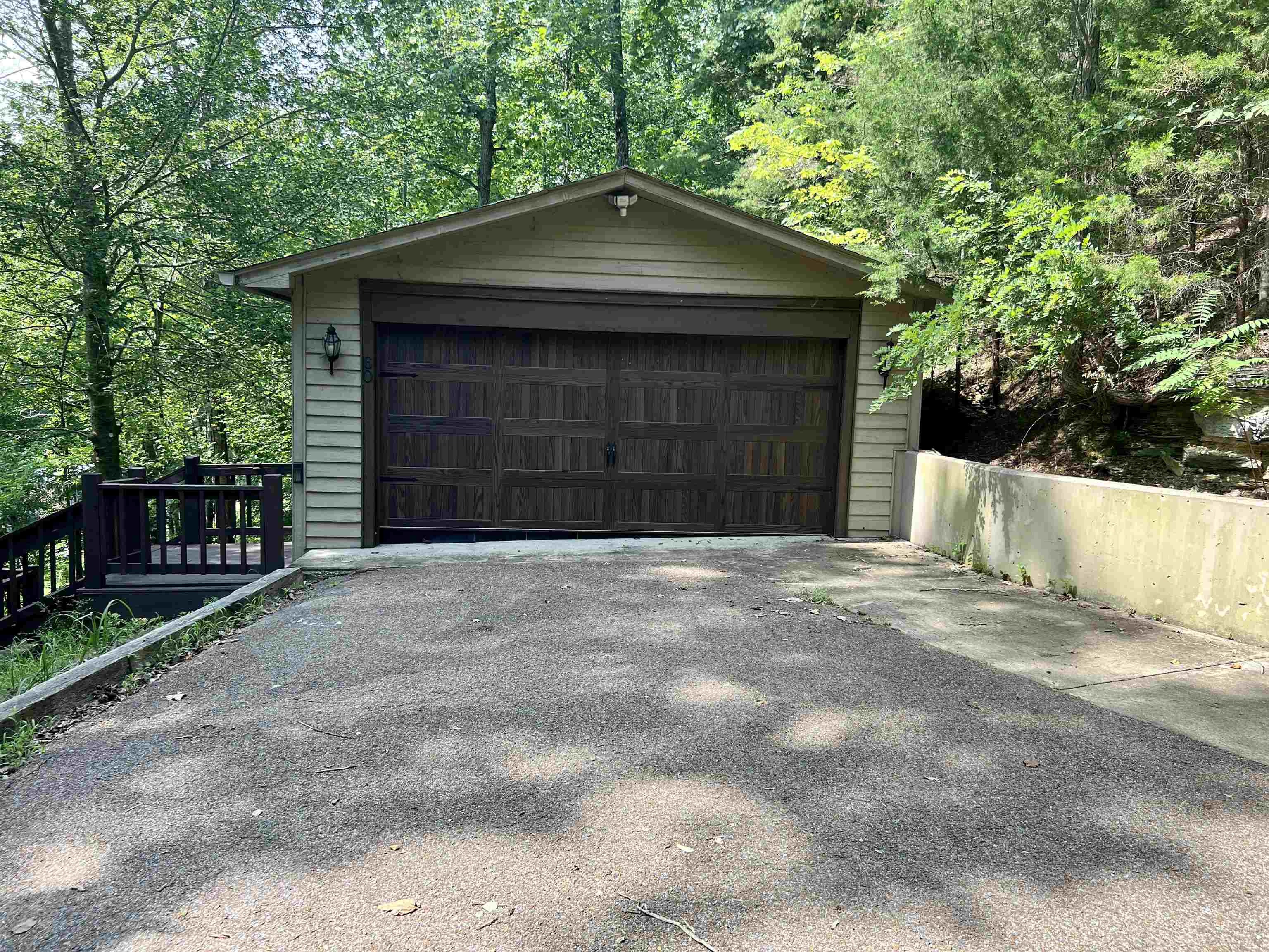 60 Point Grand Bluff Savannah, TN 38372 - Photo 24 of 34 a front view of a house with a yard and garage