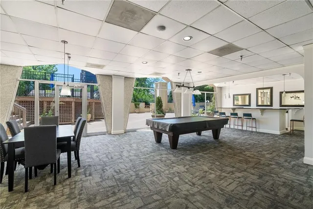 a view of a dining room with furniture