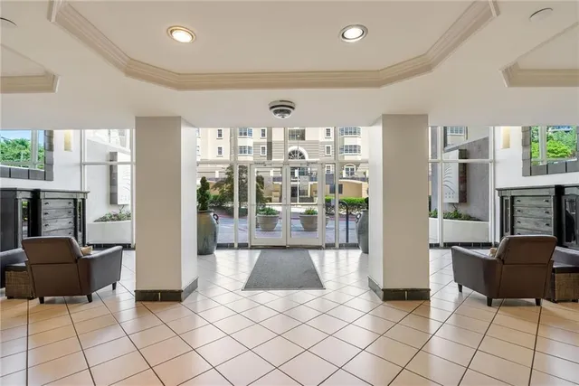 a view of a hallway with white walls