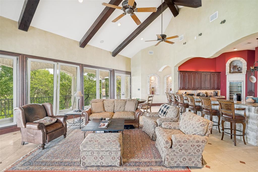 1237 Overlook Court Whitney, TX 76692 - Photo 4 of 20 a living room with furniture and a large window