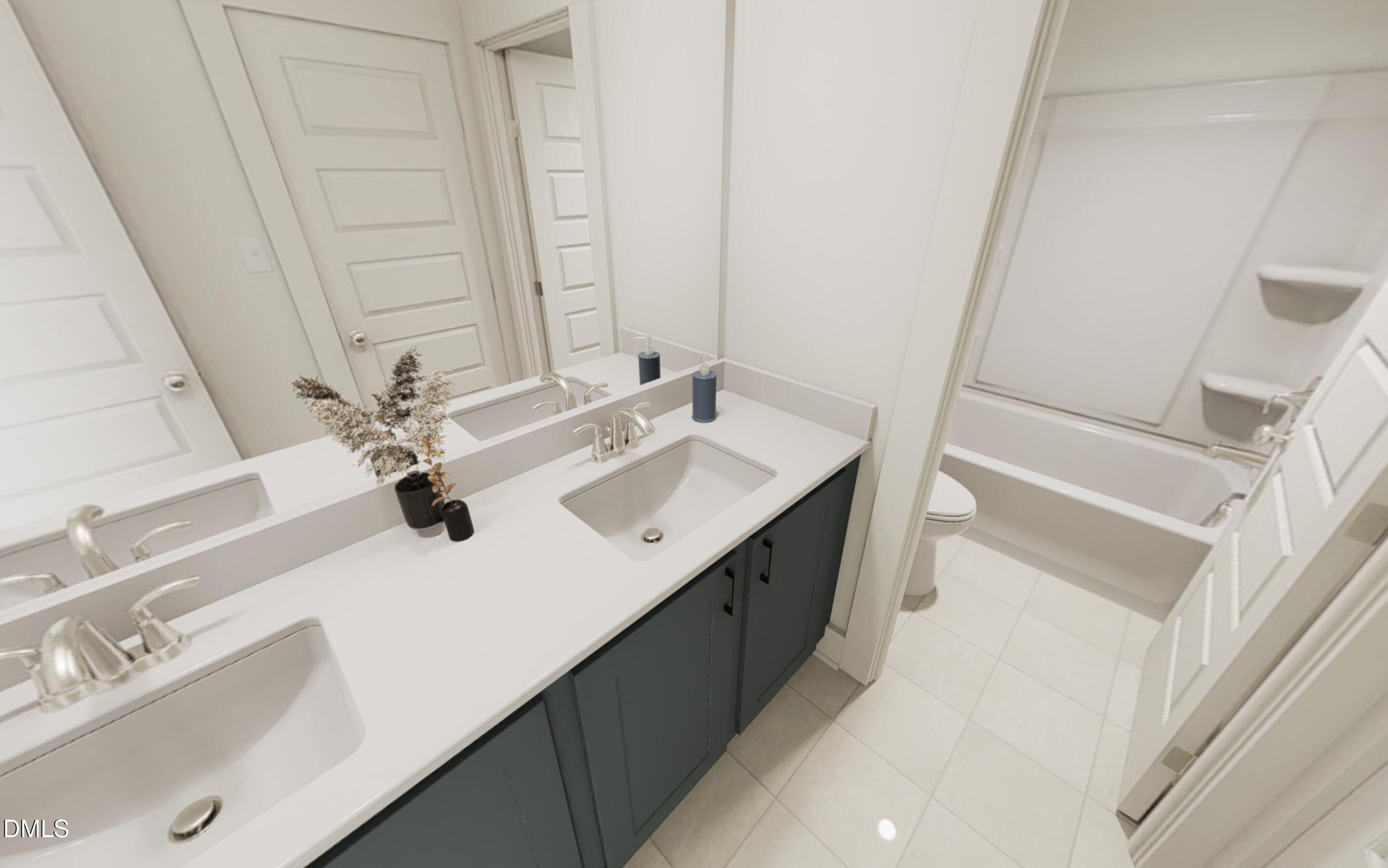 871 Central Park Drive Raleigh, NC 27604 - Photo 9 of 22 a bathroom with a sink and a mirror