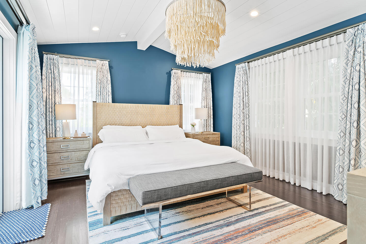 4206 Washington Road West Palm Beach, FL 33405 - Photo 25 of 50 a bedroom with a bed and a chandelier