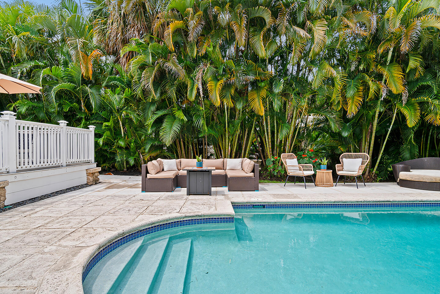 4206 Washington Road West Palm Beach, FL 33405 - Photo 43 of 50 a view of backyard with a table and chairs