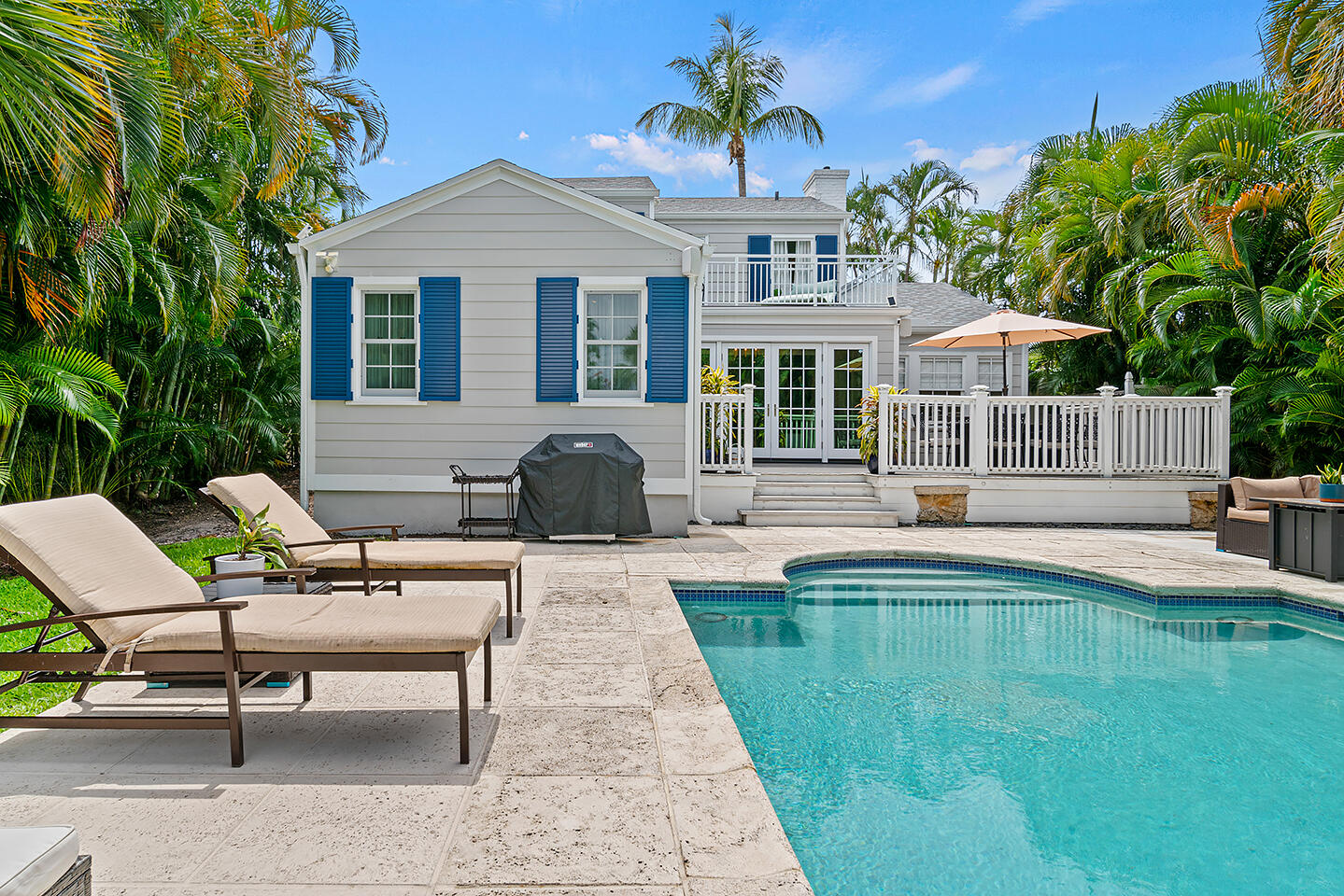 4206 Washington Road West Palm Beach, FL 33405 - Photo 45 of 50 a house view with a seating space and garden