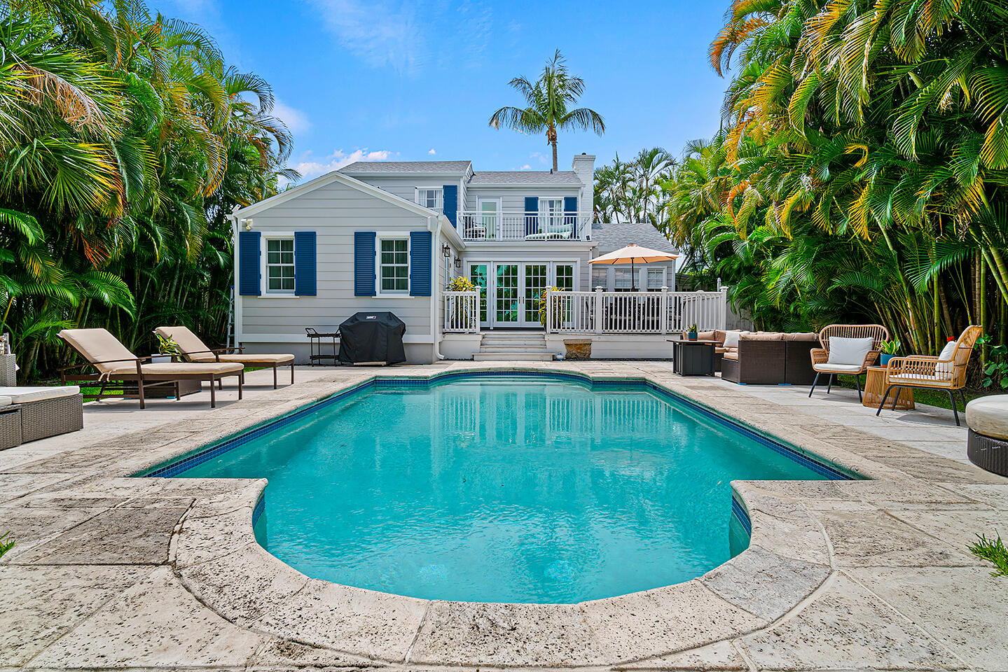 4206 Washington Road West Palm Beach, FL 33405 - Photo 47 of 50 a swimming pool with outdoor seating yard and barbeque oven