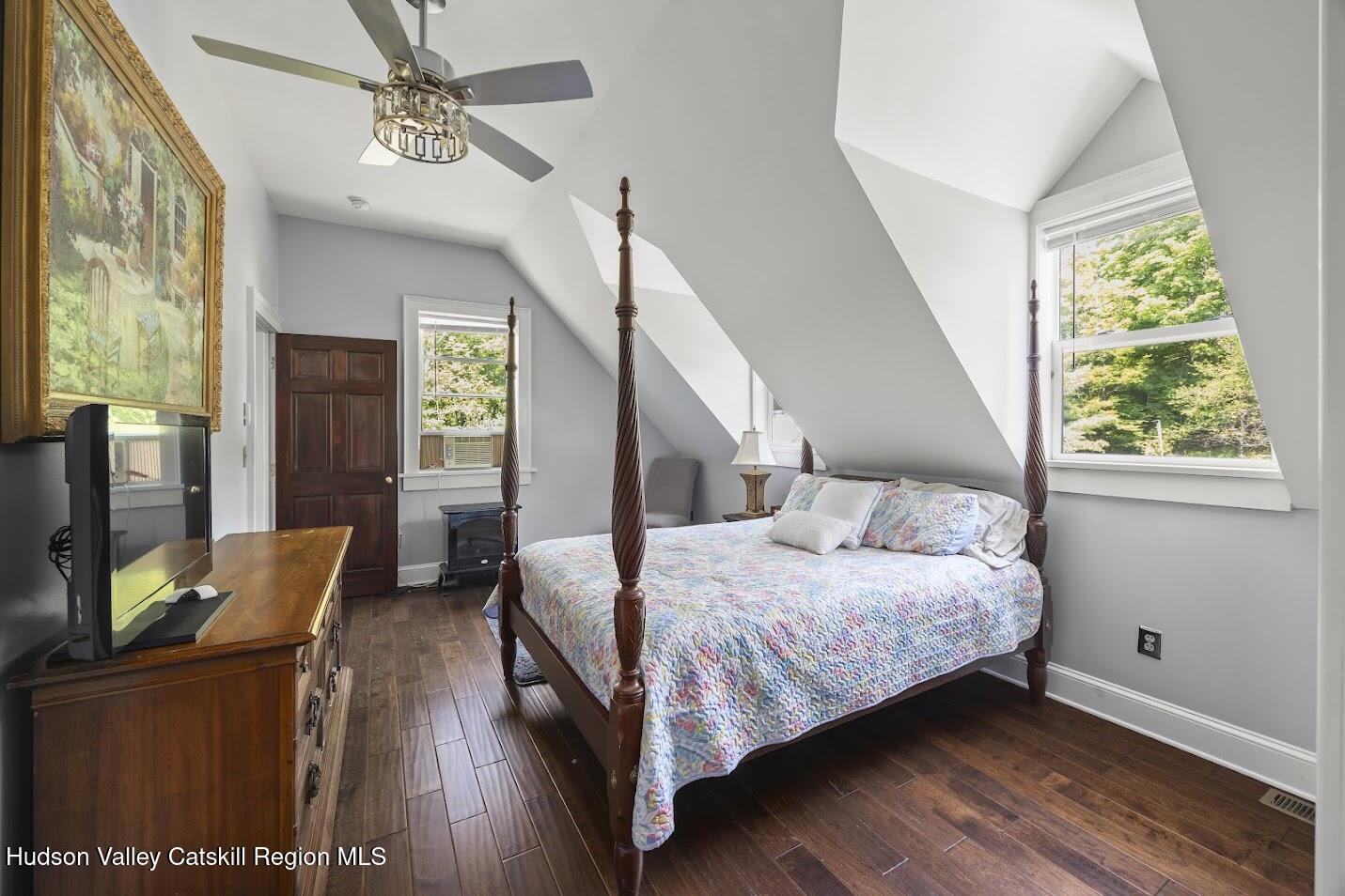 4 Greely Road Craryville, NY 12521 - Photo 16 of 37 a bedroom with a bed wooden floor and window