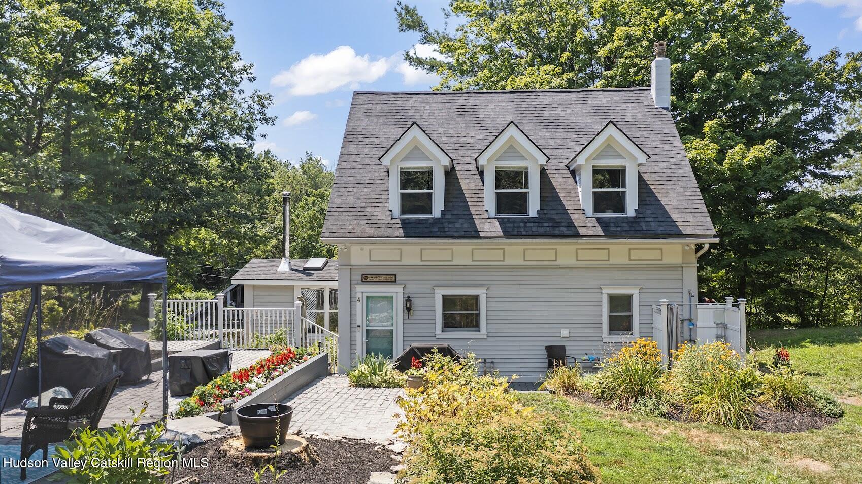 4 Greely Road Craryville, NY 12521 - Photo 22 of 37 a view of a house with yard and sitting area