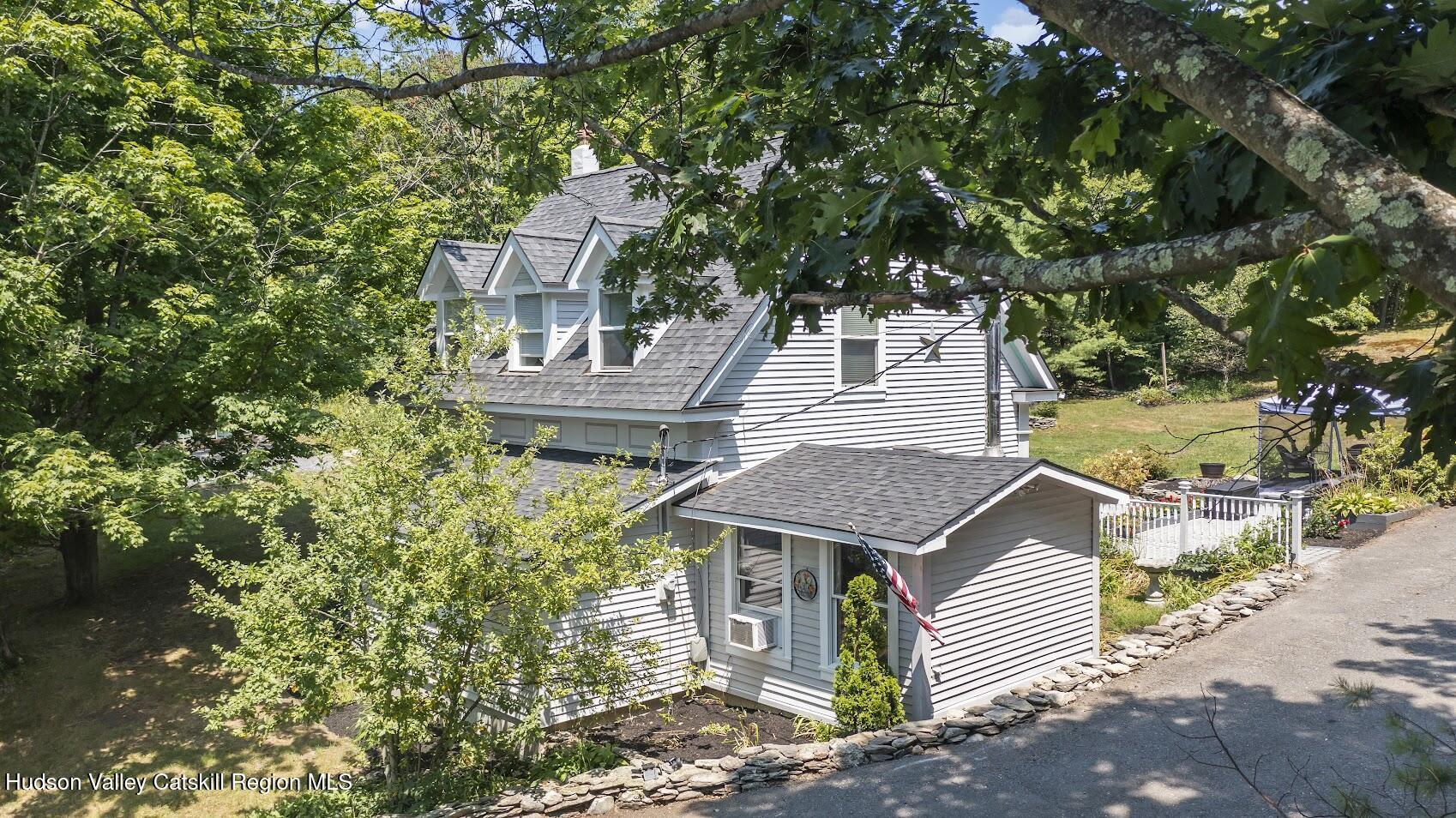 4 Greely Road Craryville, NY 12521 - Photo 26 of 37 a house view with a garden space