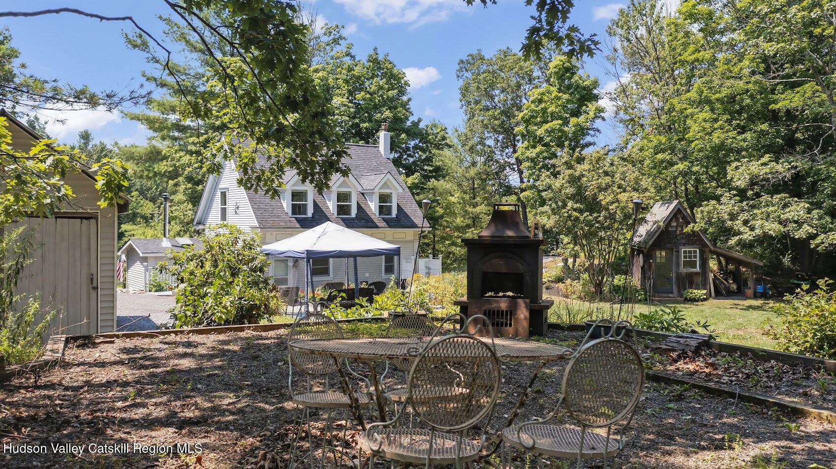4 Greely Road Craryville, NY 12521 - Photo 30 of 37 a front view of a house with yard and green space