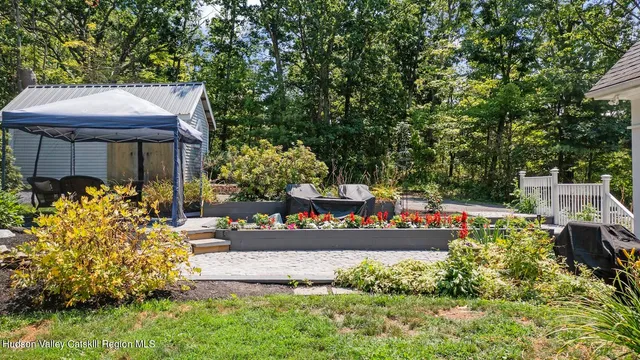 a fire hydrant in the middle of garden