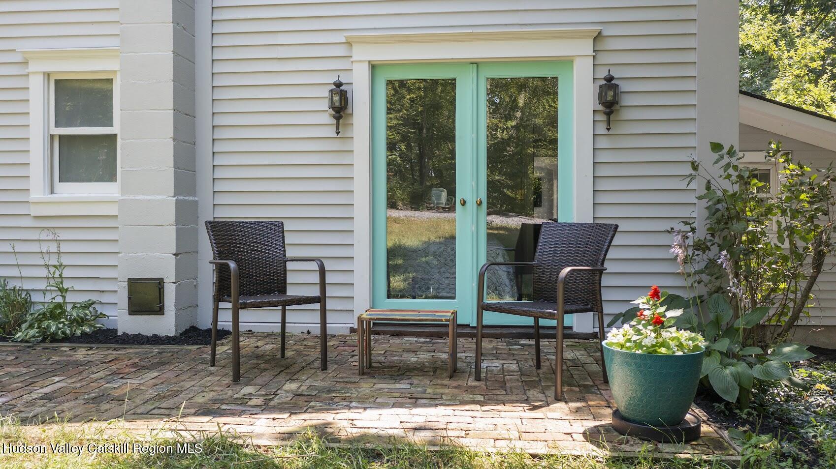 4 Greely Road Craryville, NY 12521 - Photo 34 of 37 a living room filled with furniture and a potted plant