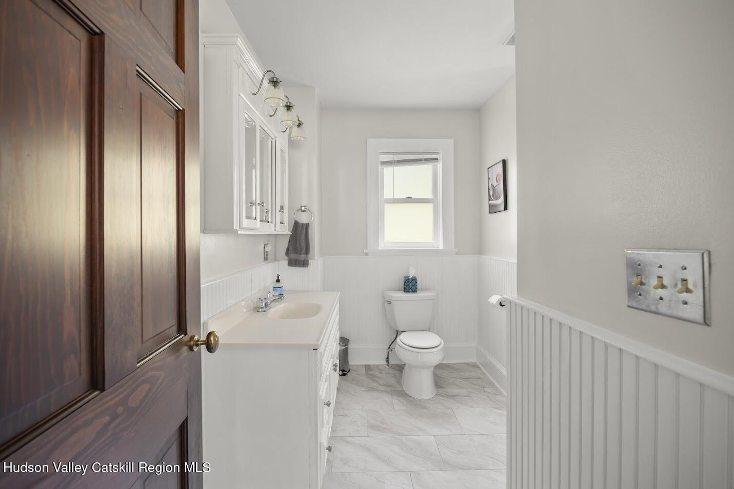 4 Greely Road Craryville, NY 12521 - Photo 9 of 37 a bathroom with a sink toilet and shower