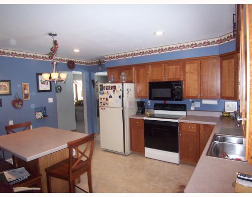 4565 Norwin Road Whitehall, PA 15236 - Photo 2 of 13 Kitchen. Cherry Finish Cabniets, with Kitchen Ilsand