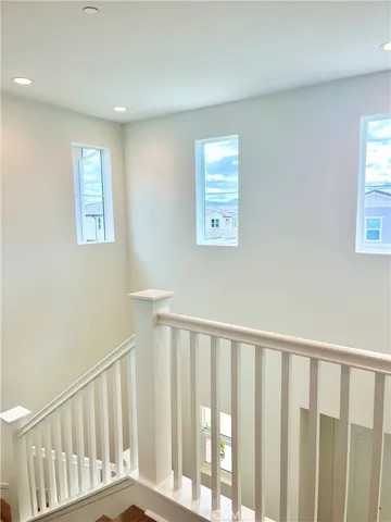 a view of staircase with window