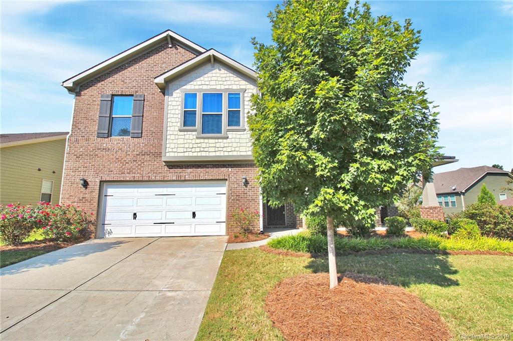 1314 Cilantro Court Tega Cay, SC 29708 - Photo 3 of 48 a view of a house with a yard and tree s