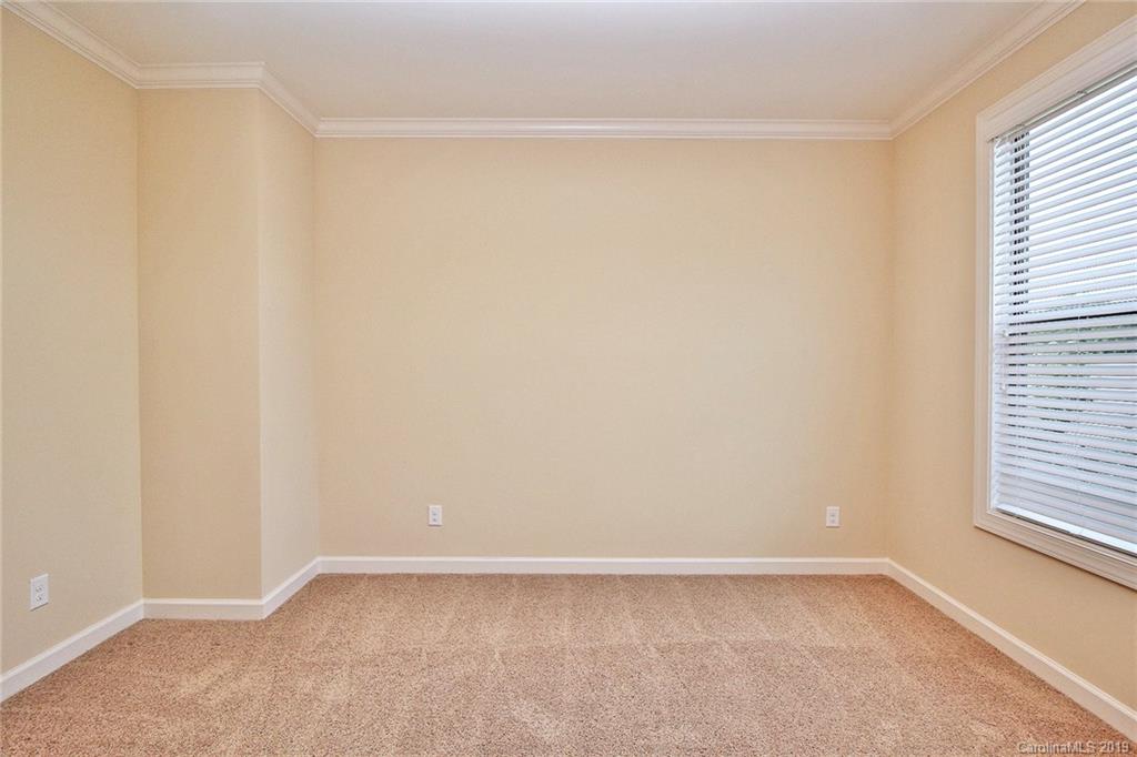 1314 Cilantro Court Tega Cay, SC 29708 - Photo 25 of 48 a view of an empty room and window