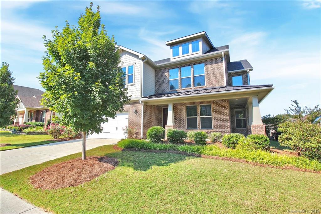 1314 Cilantro Court Tega Cay, SC 29708 - Photo 4 of 48 a front view of a house with a yard