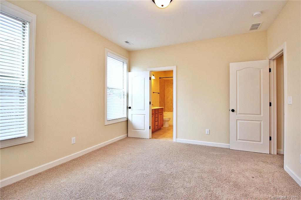 1314 Cilantro Court Tega Cay, SC 29708 - Photo 34 of 48 a view of an empty room with a window