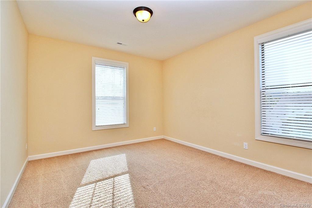 1314 Cilantro Court Tega Cay, SC 29708 - Photo 38 of 48 a view of a livingroom with a window