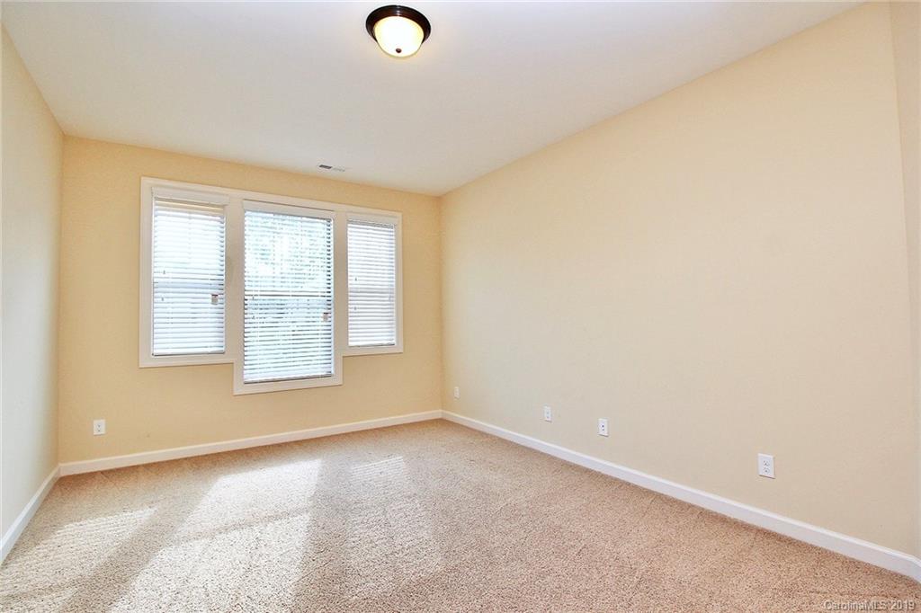 1314 Cilantro Court Tega Cay, SC 29708 - Photo 40 of 48 an empty room with a window