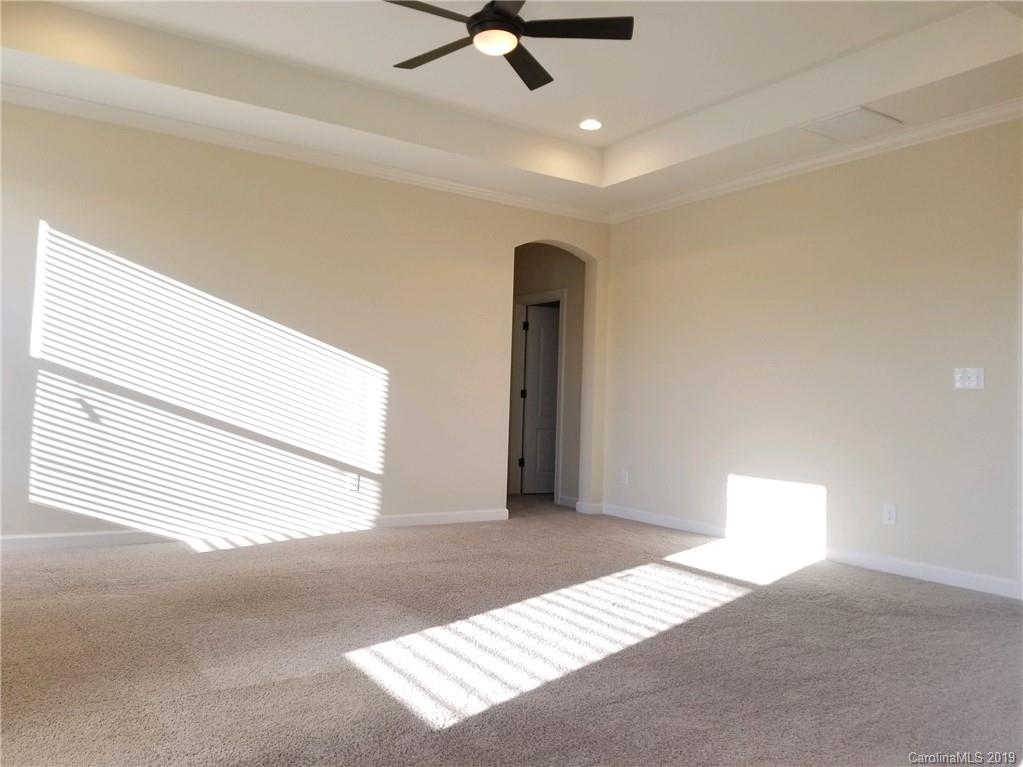 1314 Cilantro Court Tega Cay, SC 29708 - Photo 41 of 48 a view of an empty room with a window