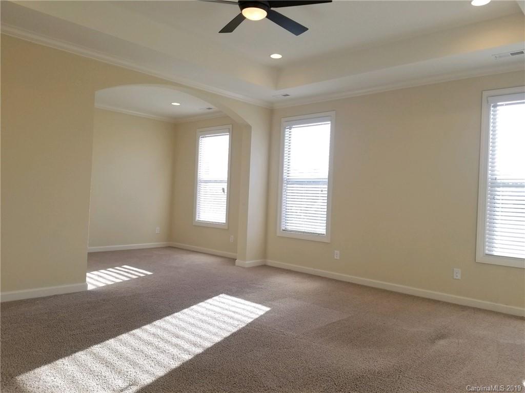 1314 Cilantro Court Tega Cay, SC 29708 - Photo 42 of 48 a view of an empty room with a window