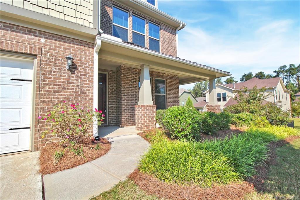 1314 Cilantro Court Tega Cay, SC 29708 - Photo 6 of 48 front view of a house with a yard