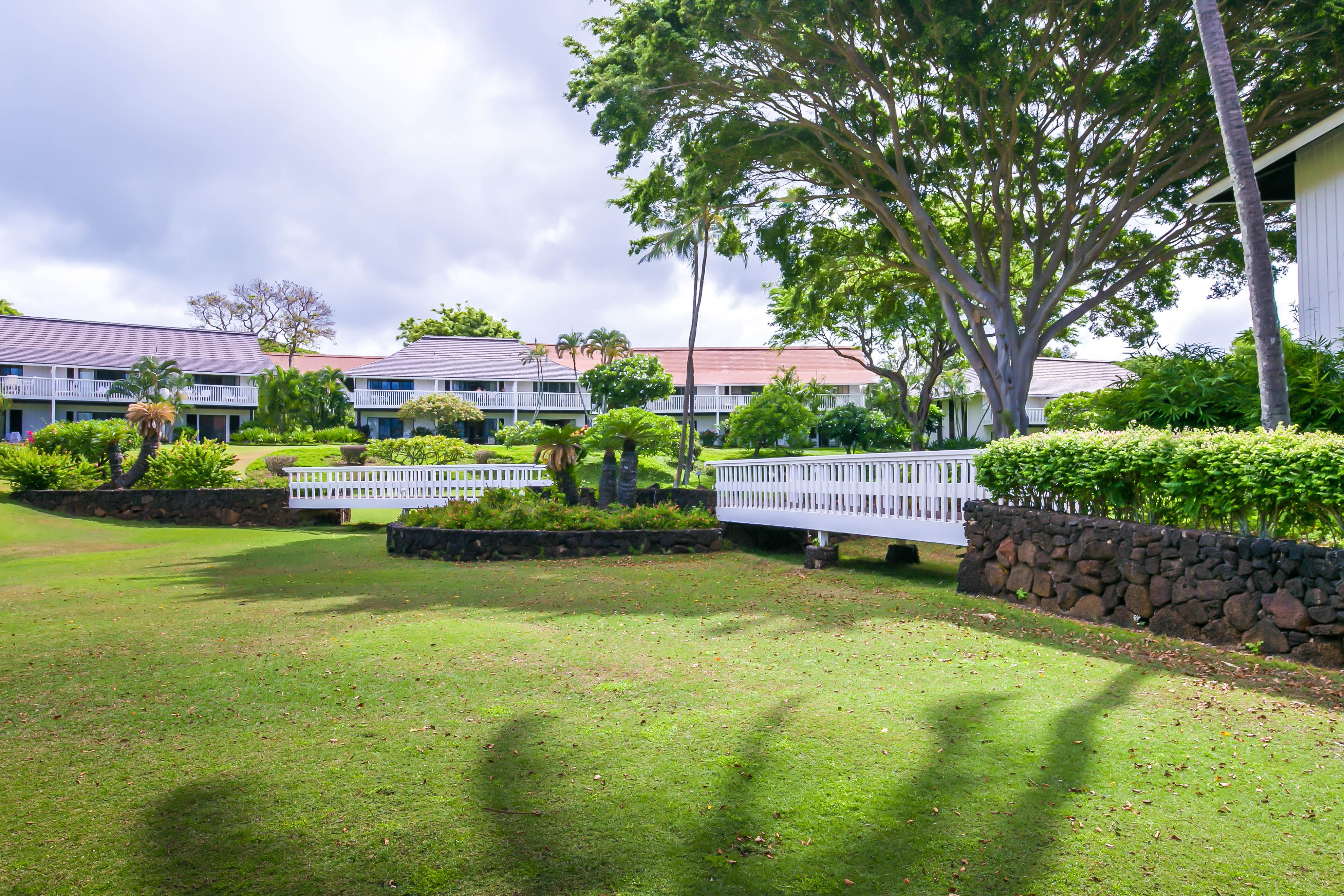 2253 Poipu Road, Unit 425 Koloa, HI 96756 - Photo 1 of 18 a garden view with a seating space
