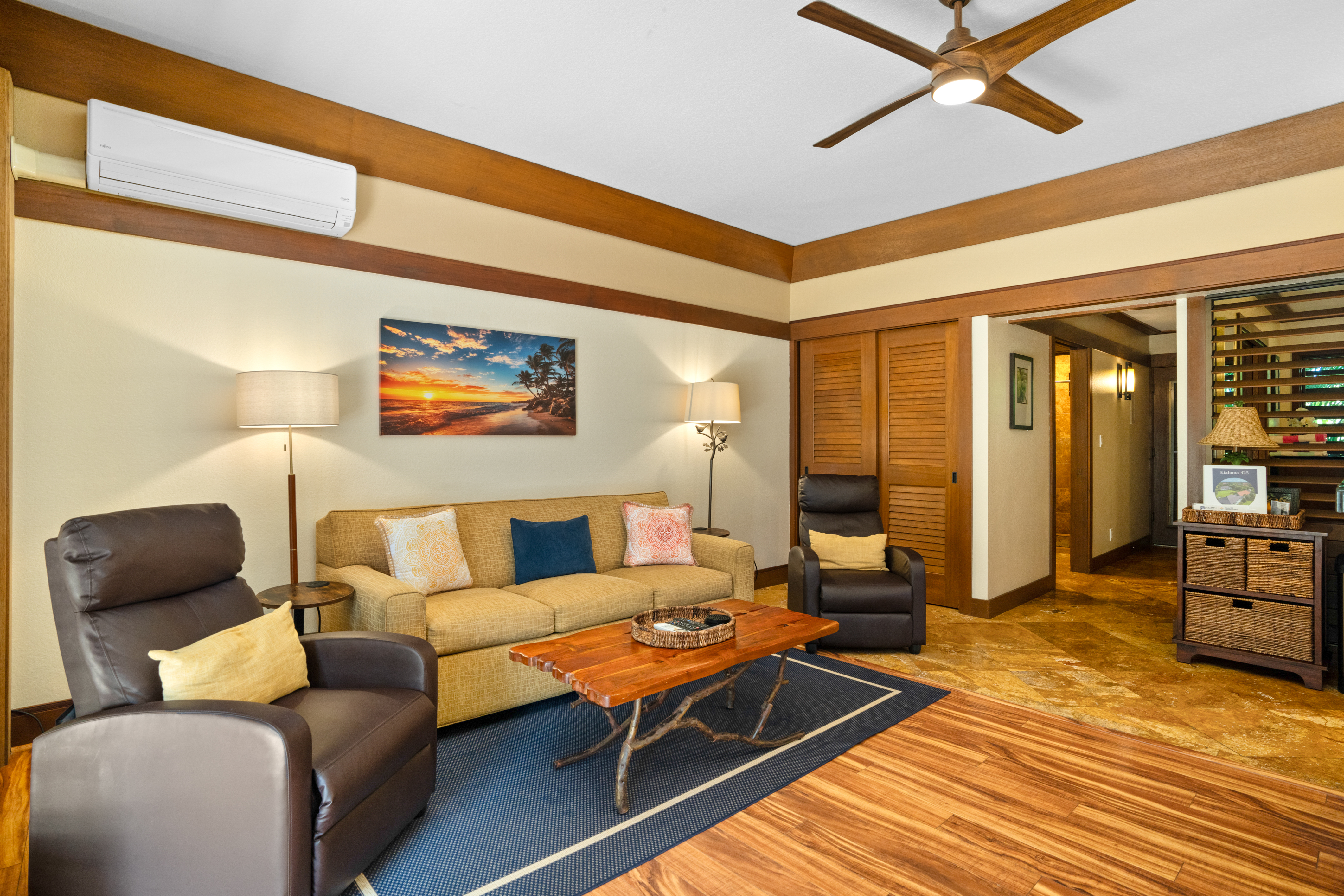 2253 Poipu Road, Unit 425 Koloa, HI 96756 - Photo 14 of 18 a living room with furniture and wooden floor