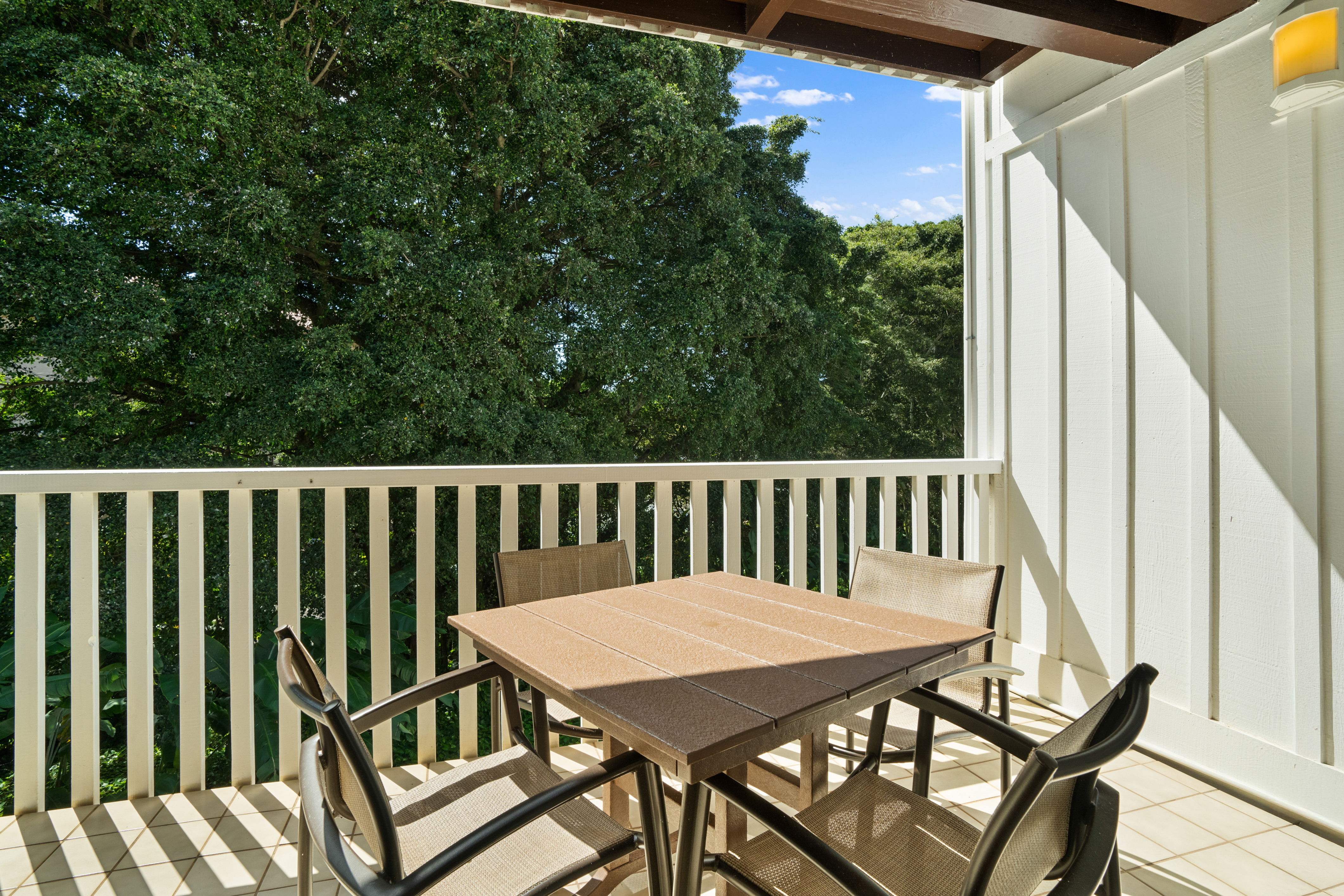 2253 Poipu Road, Unit 425 Koloa, HI 96756 - Photo 16 of 18 a view of a wooden bench on the deck