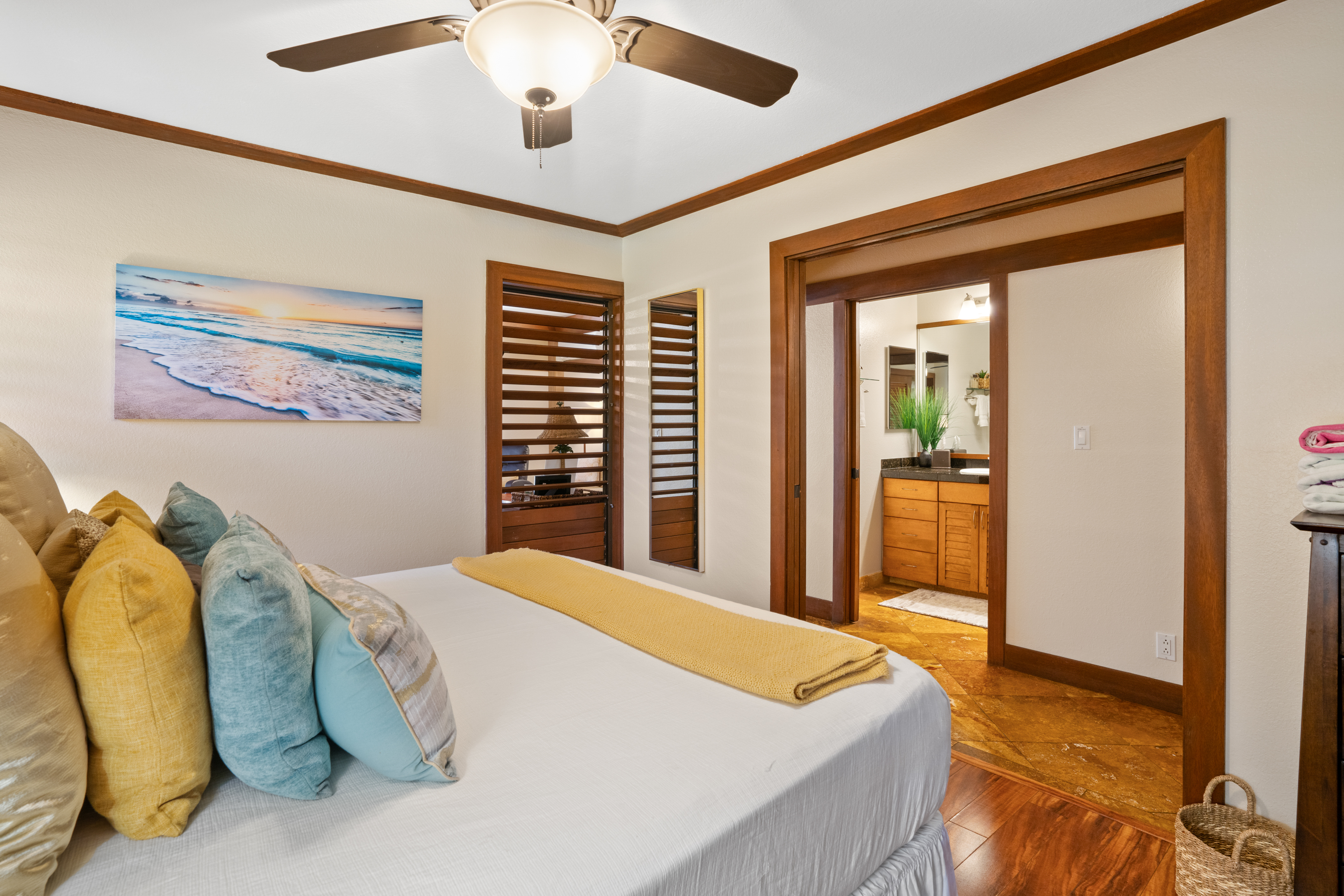 2253 Poipu Road, Unit 425 Koloa, HI 96756 - Photo 4 of 18 a spacious bedroom with a bed and a chandelier