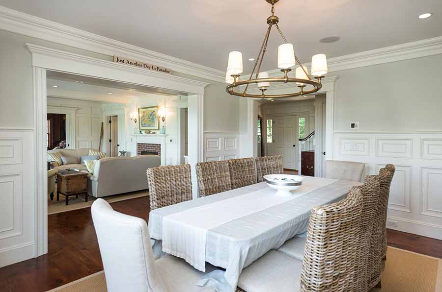 36 Down Harbor Road Edgartown, MA 02539 - Photo 12 of 54 a dining room with wooden floor a chandelier a wooden table and chairs