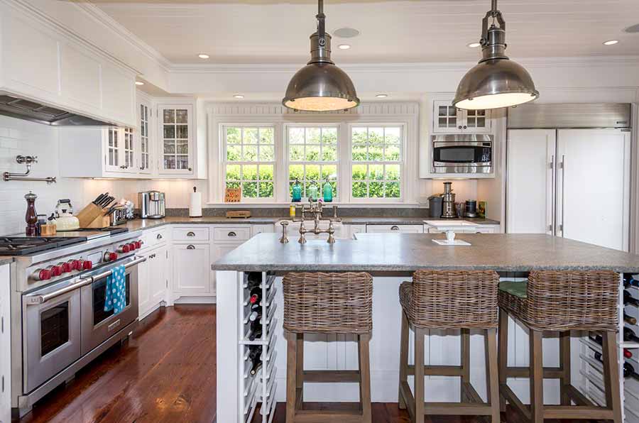 36 Down Harbor Road Edgartown, MA 02539 - Photo 14 of 54 a kitchen with stainless steel appliances granite countertop a stove a sink and a refrigerator