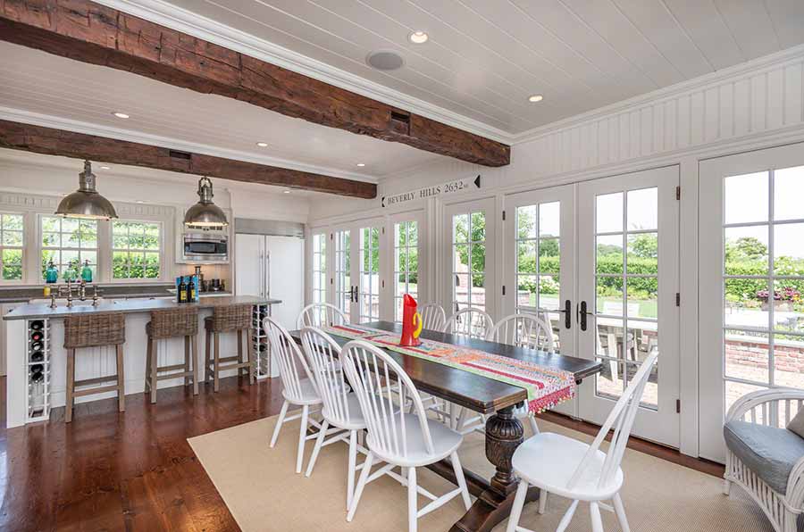36 Down Harbor Road Edgartown, MA 02539 - Photo 15 of 54 a dining room with furniture window and wooden floor