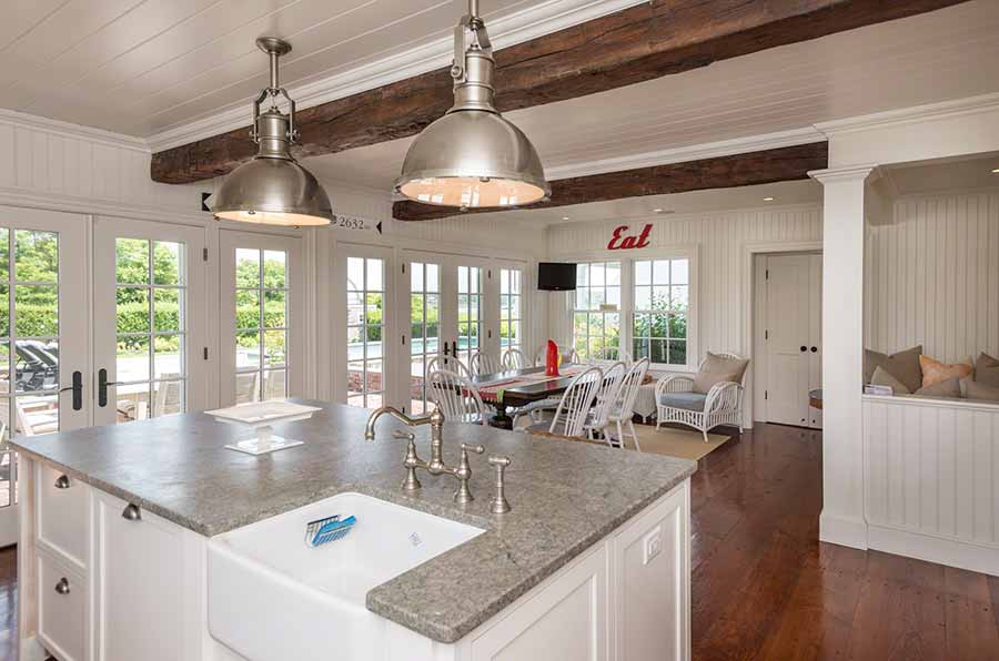 36 Down Harbor Road Edgartown, MA 02539 - Photo 17 of 54 a kitchen with granite countertop a sink a counter top space and living room view