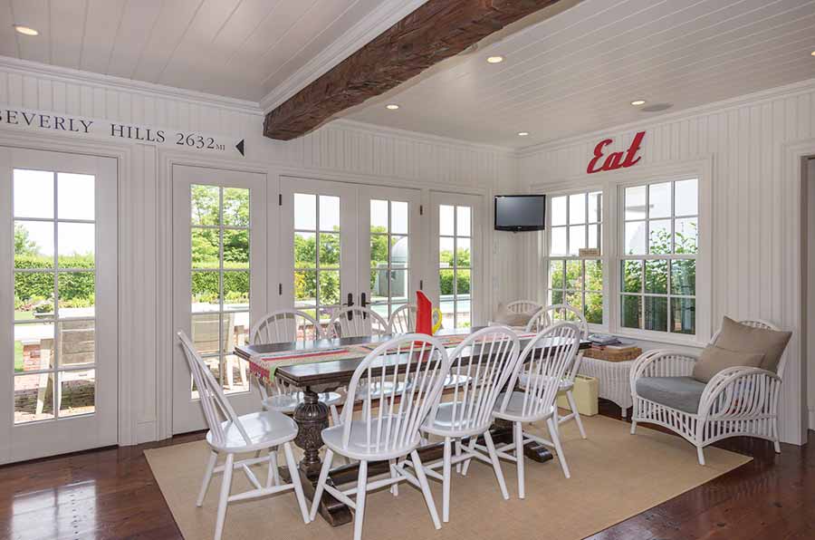 36 Down Harbor Road Edgartown, MA 02539 - Photo 18 of 54 a view of a dining room with furniture wooden floor and chandelier