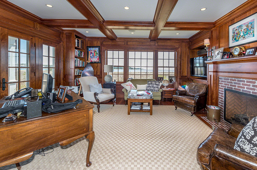 36 Down Harbor Road Edgartown, MA 02539 - Photo 22 of 54 a living room with furniture a fireplace and a flat screen tv