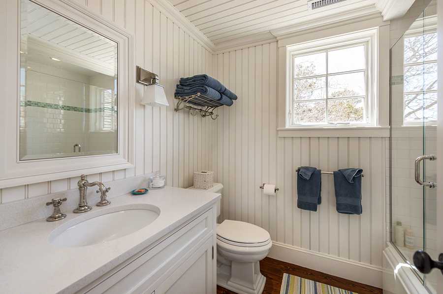 36 Down Harbor Road Edgartown, MA 02539 - Photo 37 of 54 a bathroom with a sink a toilet and shower
