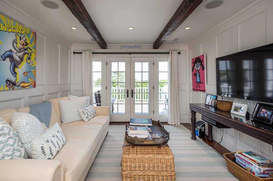 36 Down Harbor Road Edgartown, MA 02539 - Photo 45 of 54 a living room with furniture flat screen tv and a large window