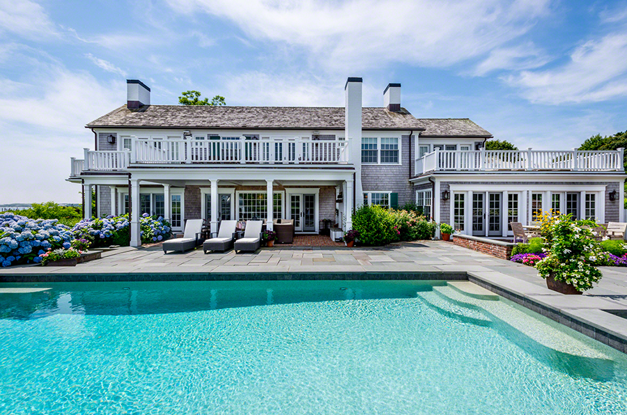 36 Down Harbor Road Edgartown, MA 02539 - Photo 46 of 54 a front view of a house with swimming pool having outdoor seating