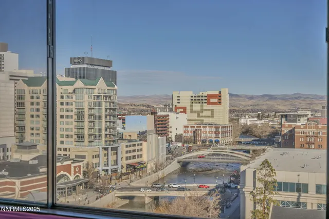 a view of a city with tall buildings