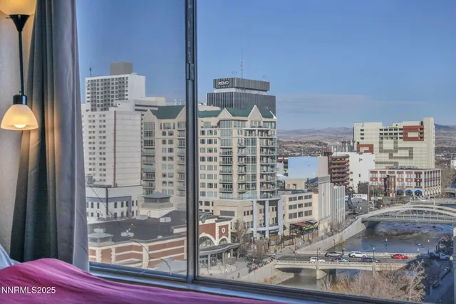 a view of a city with tall buildings