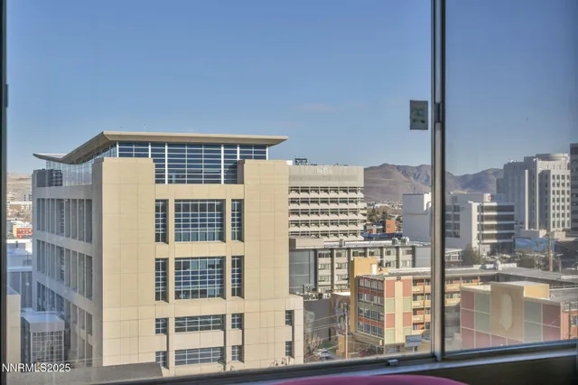 a front view of a building with city view