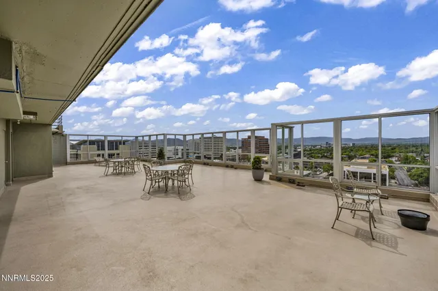 a view of a terrace with sitting area