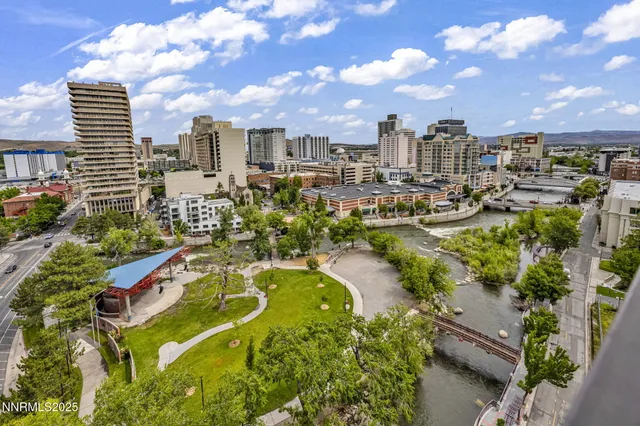 a view of a city with tall buildings