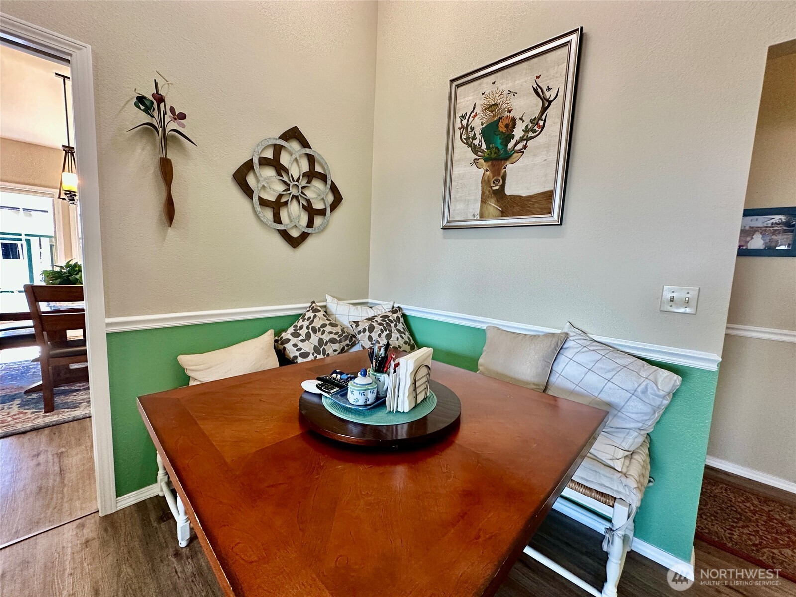 1919 Creekside Place Anacortes, WA 98221 - Photo 9 of 25 a view of a dining room with furniture window and wooden floor