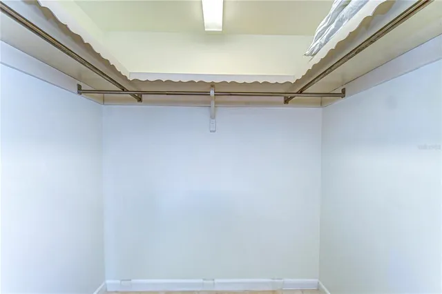 a view of a room with racks on the wall