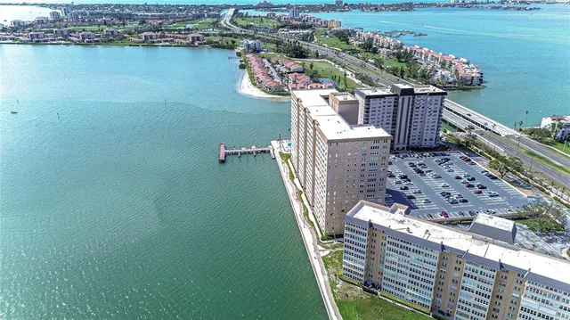 a balcony with couple of plants and trees